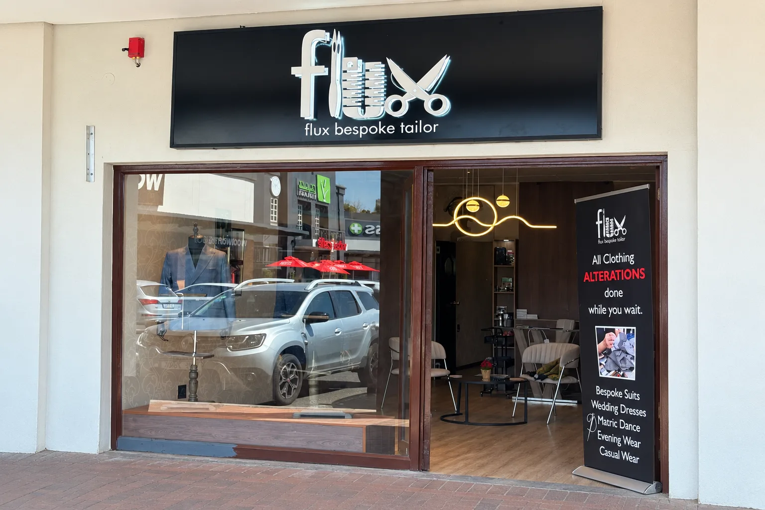 The Flux Bespoke Tailor shopfront at Douglasdale Village, Douglasdale